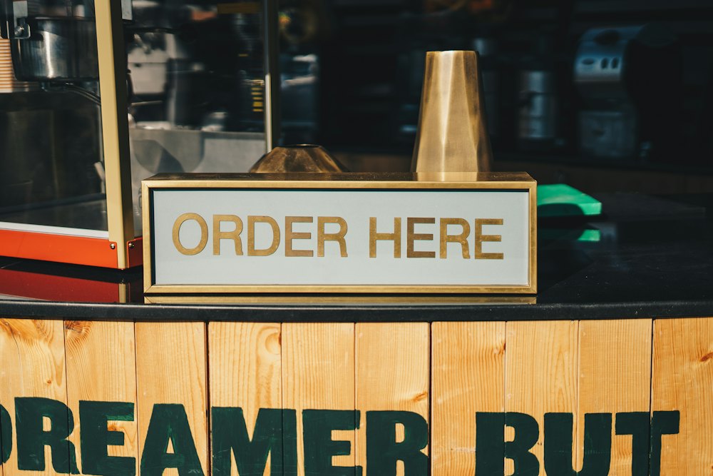 Illuminated Order Here lightbox sign